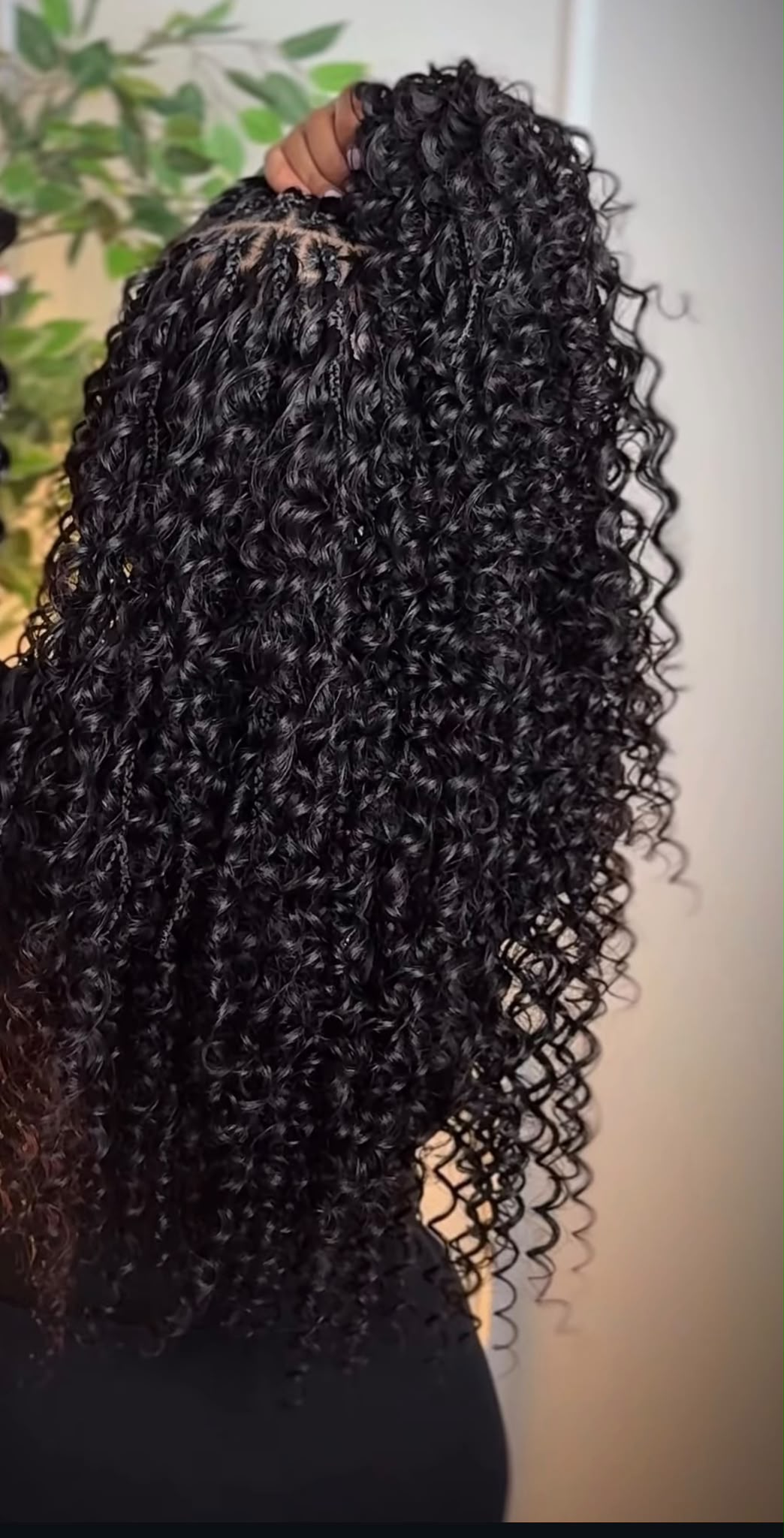 Close-up of curly protective styling